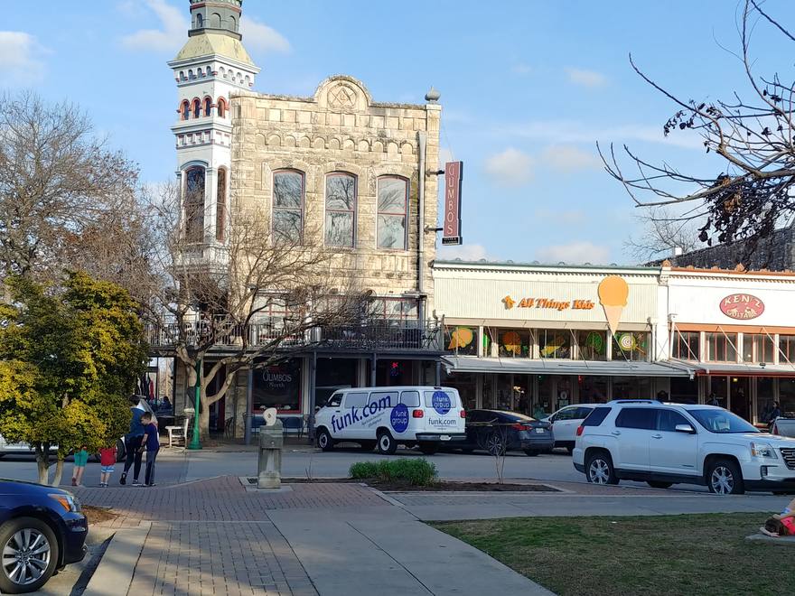 Gumbo’s North and shops on the Georgetown Square with the Funk Group van