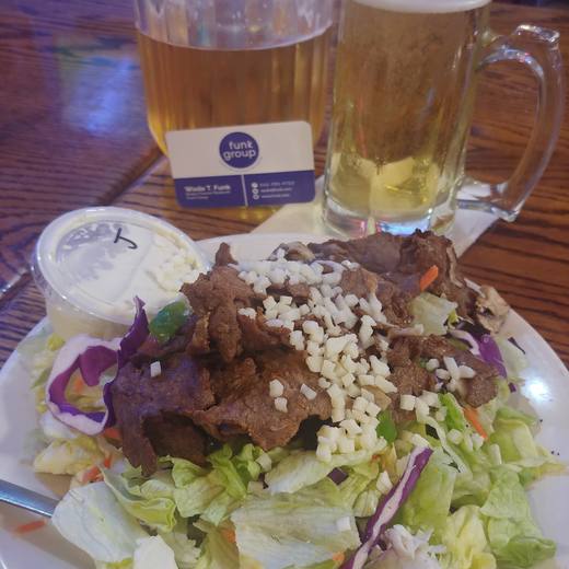 Steak salad and cold beer at Southern’s Pizza and Sports Pub, Leander